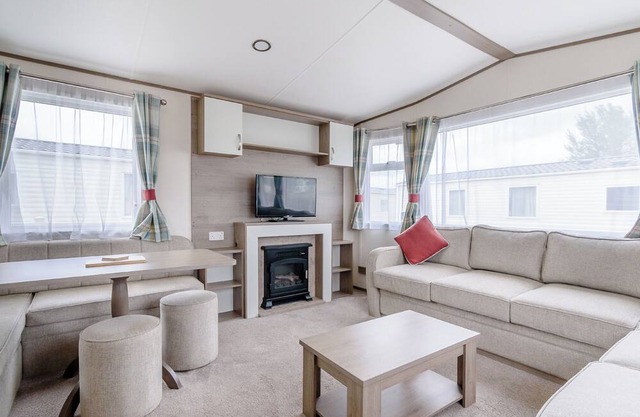 12ft-wide very comfortable and spacious caravan with one double and two twin.