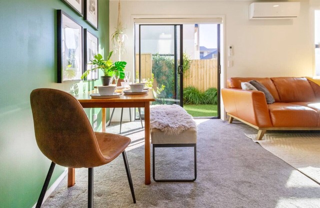 2-Bed Oasis with a King Bed and Green Accents