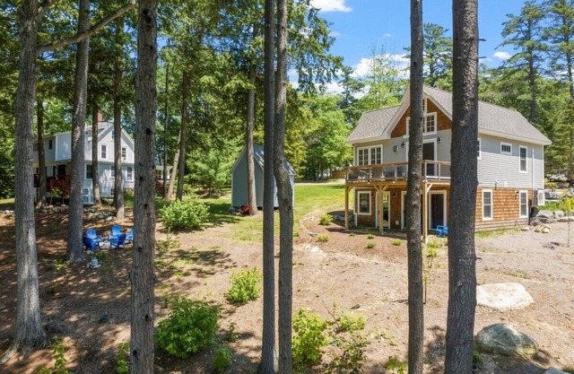 2 Lake Winnipesaukee waterfront homes, 2 boat slips, dogs welcome, hosts 18