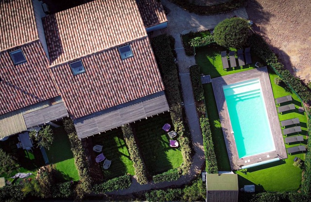2 semi-detached air-conditioned mini villas with heated swimming pool to share