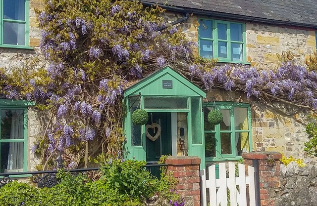 2 WISTERIA COTTAGES, pet friendly, with open fire in Tatworth