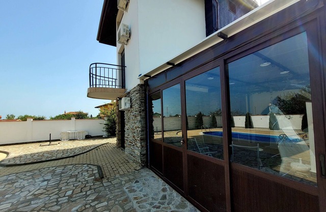 3-storey villa with swimming pool and veranda on the coast