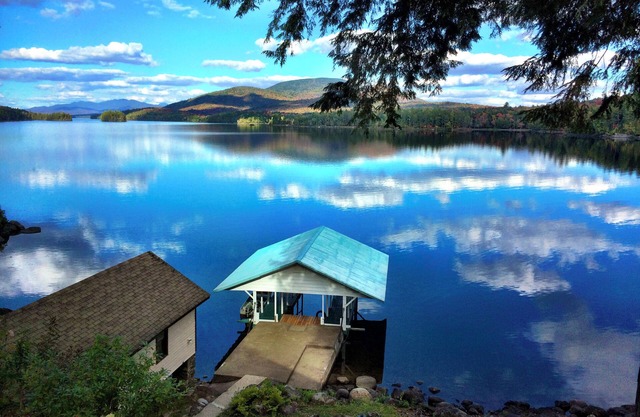 5-bedroom, 1,300' waterfront estate with three separate residences & eight acres