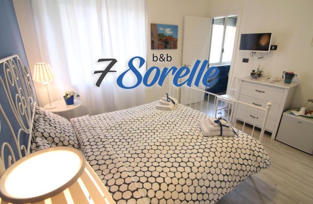 "7 SORELLE B&B" camere in pieno centro città con bagno privato, FREE HIGH SPEED WI-FI, NETFLIX
