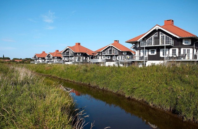 8 person holiday home on a holiday park in Bogense