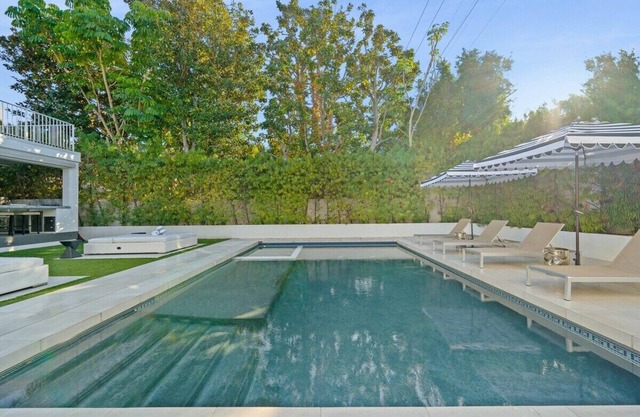 A beautifully maintained traditional style home located in the iconic Beverly Hills Flats