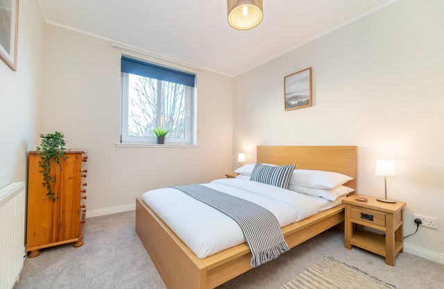 A delightful two-bedroom apartment with private parking space. Sleeps 6.