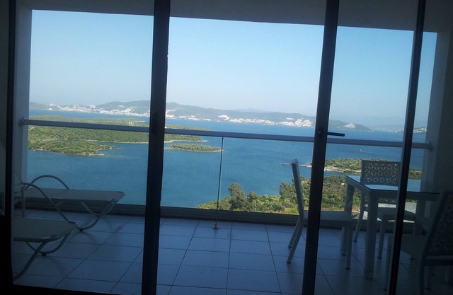 A modern to bedroom luxury apartment, in a resort overlooking the Aegean Sea.