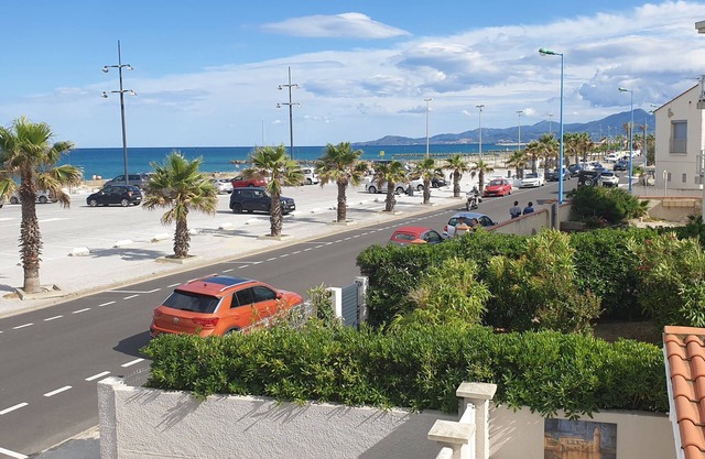 A seafront dream with garden and private parking.
