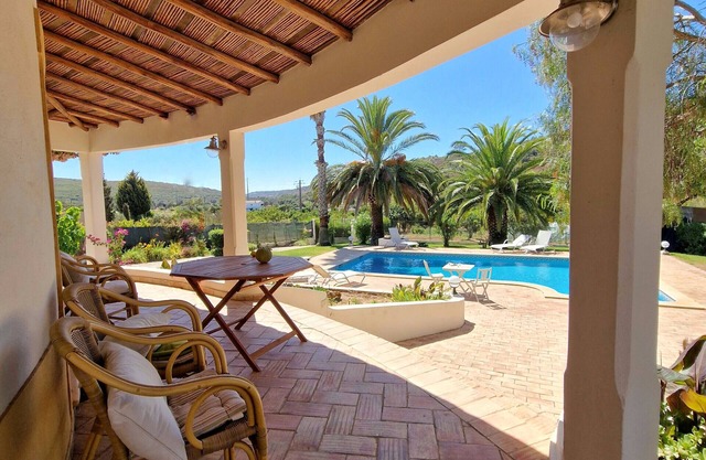 A south-facing, Mediterranean-style villa on 2 levels, walled and gated in a tranquil country setting, yet only 10 minutes from the popular historic, seafront city of Lagos in the Western Algarve