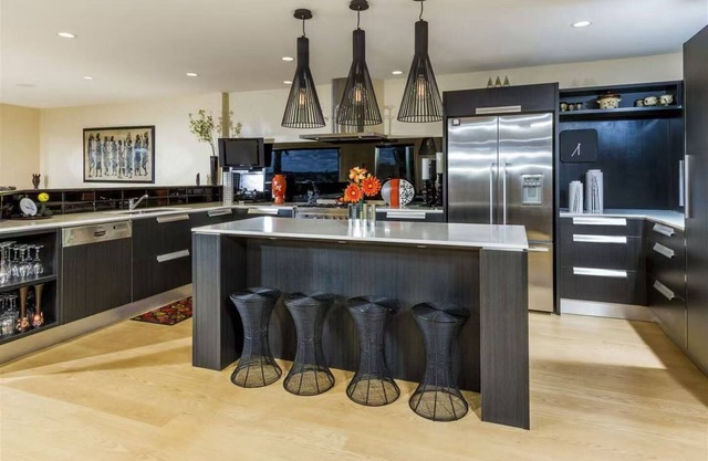 A stunning cliffside home with an expansive 270-degree panoramic sea view.