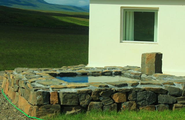 A wonderful small and cosy house with a private natural hot tub, fantastic views