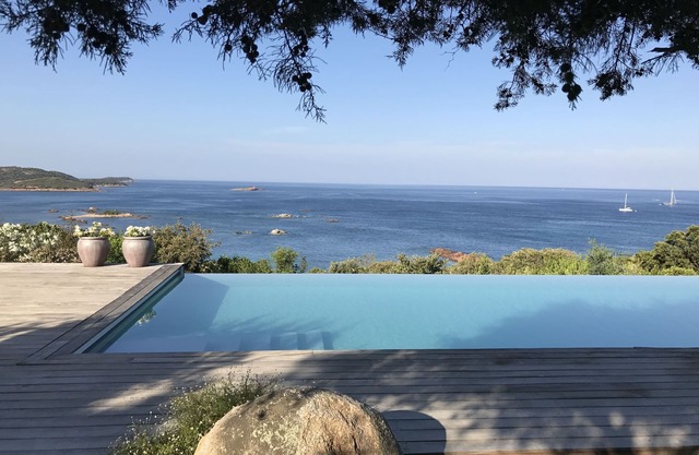 Air-conditioned waterfront villa with pool and beach