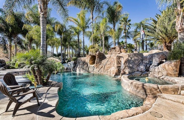 Amazing Pool Oasis Getaway with waterfall & slide! Instagram- resortliving4you