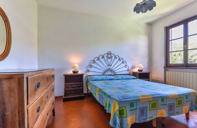 Apartment 'Appartamento Spazioso Nel Verde' with Private Terrace, Shared Garden and Wi-Fi