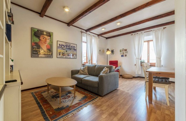 Apartment located on the second floor of a typical period building without a lift.In 55 square meters of space it comfortably accommodates 3 people.Located in a strategic position a short distance from the Colosseum, the Colle Oppio Park and the Basilica