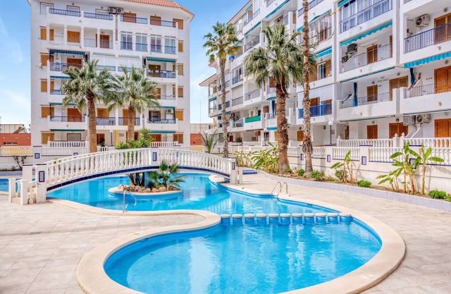 Apartment 'Playa La Mata' with Shared Pool, Wi-Fi and Air Conditioning