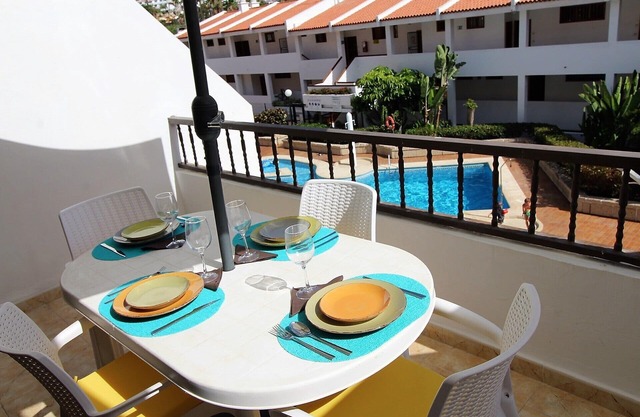 Apartment with large terrace and beautiful pool view, solarium, private parking