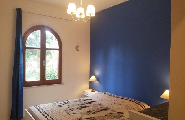 Apartment with large garden and tennis court