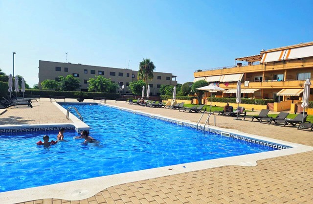 Apartment with pool near the beach