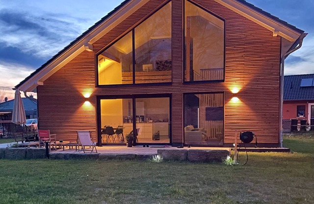 Architect's house with open gallery and large garden near the lake