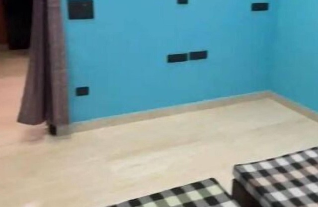 Babbu's Smart Residencies Blue Room