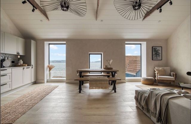 Beachfront eco-friendly penthouse with ocean view and modern interior sleeping up to 5