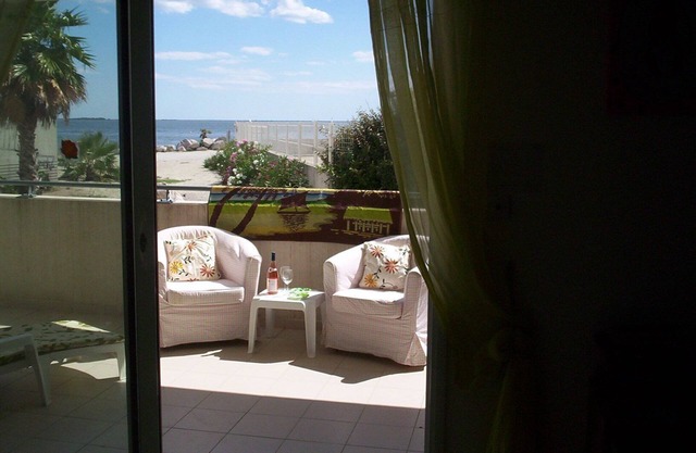 Beachside sea views, aircon, internet, modern, private parking