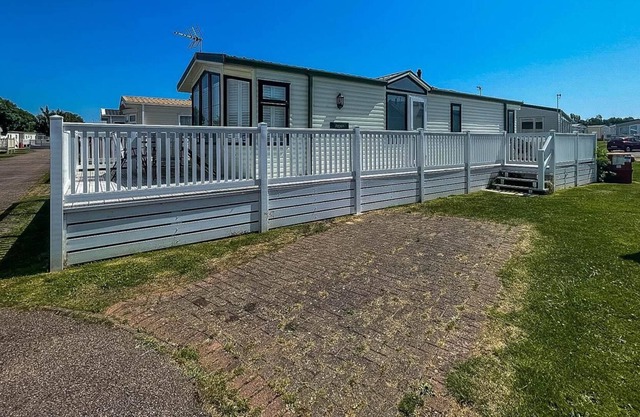 Beautiful 4 berth caravan with decking at Naze Marine Park ref 17013HP