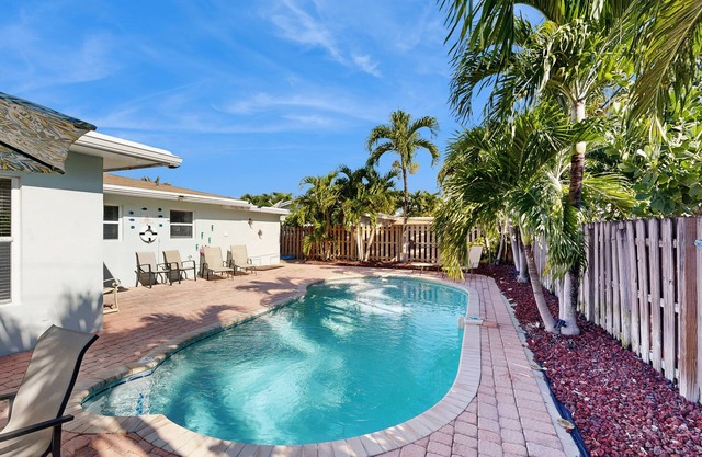 Beautiful & airy dog-friendly home near the beach with private pool, yard, grill