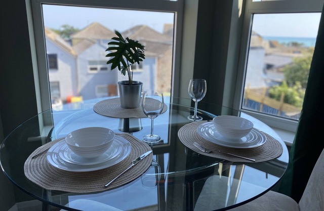 Beautiful central studio flat in town with sea views & parking. Pet friendly.