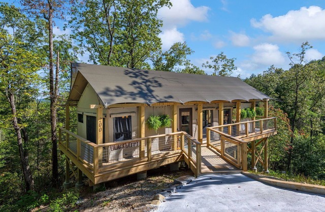 Beautiful Crafted Firefly Tent surrounded by Pristine Wilderness at Tuxedo Falls