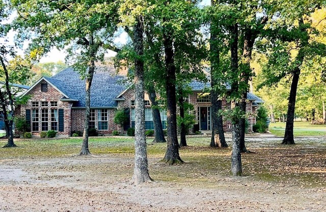 Beautiful Custom 4 bed with pool home with 3 acres. Private spacious backyard.