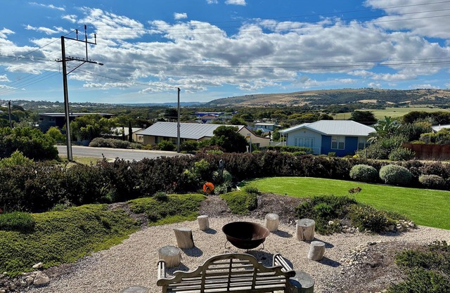 Beautiful home 150m to Boomer Beach with views to the hills, sleeps 8.