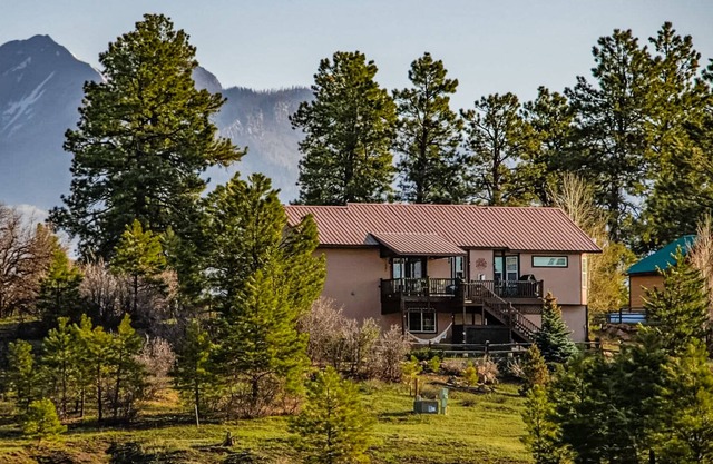 Beautiful home with mountain view, fireplace, game room, balcony, & washer/dryer