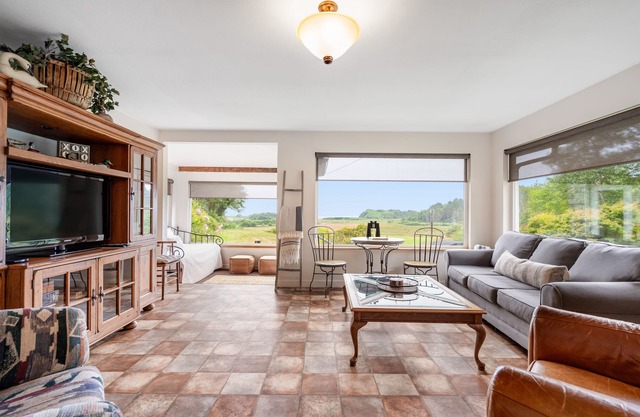 Beautiful home with ocean and beach views, wood-burning stove & firepit