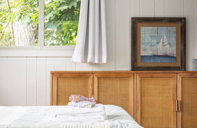 Beautiful Leelanau County cottage & guest bunkhouse on 75' of waterfront.