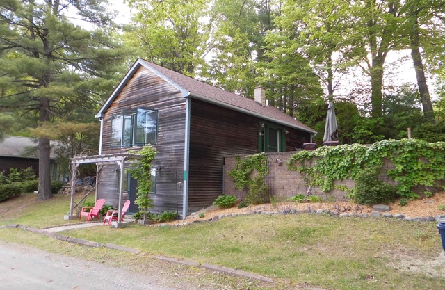 Beautifully appointed lake-view cottage with dock access