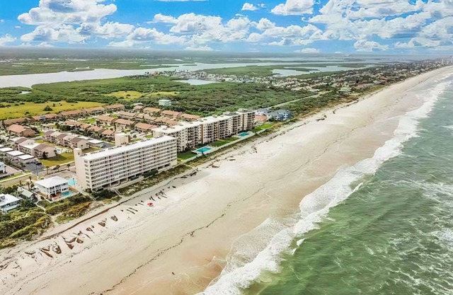 Beautifully remodeled waterfront condo w/a shared pool & beach view