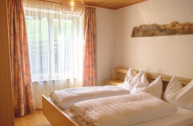 Beckenbinder Garden Apartments / cozy apartment with balcony and view of the Dolomites