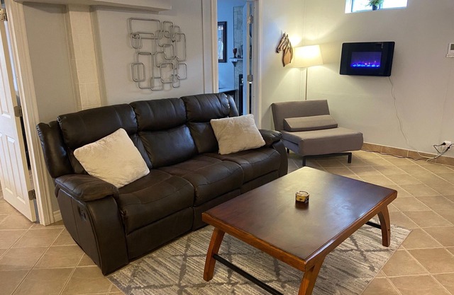 Bed of Roses Short Term Rental. Hot Tub! Bright 2 bdrm basement. Sleeps 4.