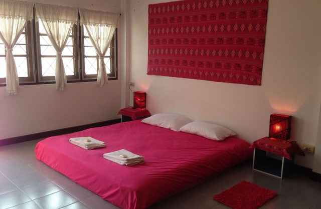 Bedroom on a private floor with a king size bed and ensuite bathroom