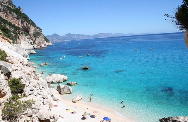 Bedroom with double bed, veranda with view