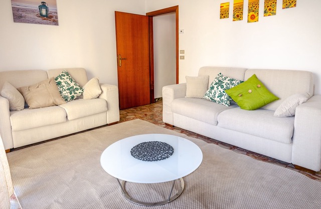 Between the umbrella and the paddock