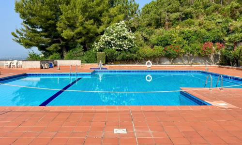 Bilocale con piscina condominiale