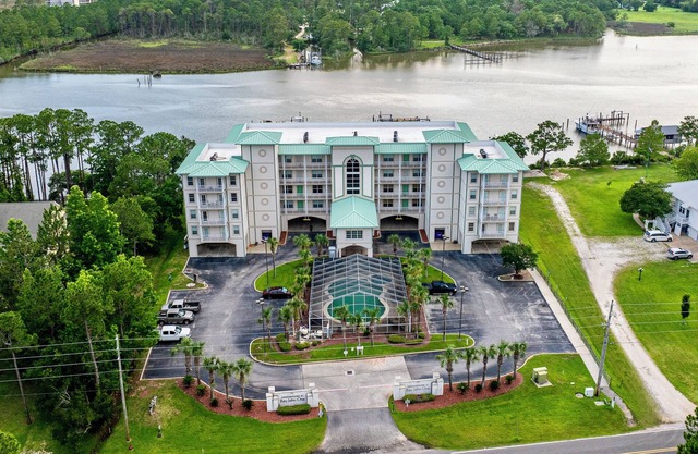 BOAT SLIP! Stay Monthly Oyster Bay Retreat for 6! Waterfront Condo w/ Resort Ame