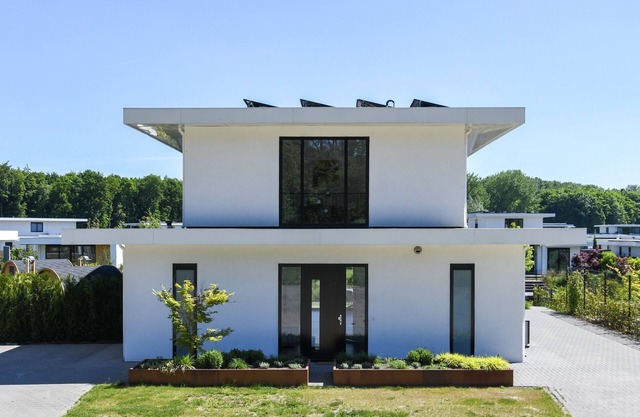 Brand-new 10-person waterfront villa with hot tub, sauna, trampoline and private jetty – perfect for a luxury family getaway.