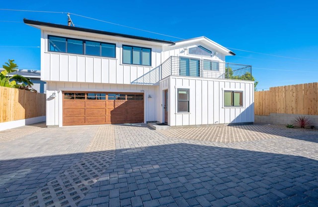 Brand new 3 bedroom 2-1/2 bath modern farmhouse style beach house.