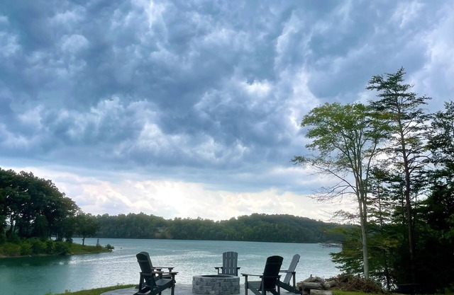 BRAND NEW Lake Front home. Private cove and boat dock! Modern farmhouse appeal!
