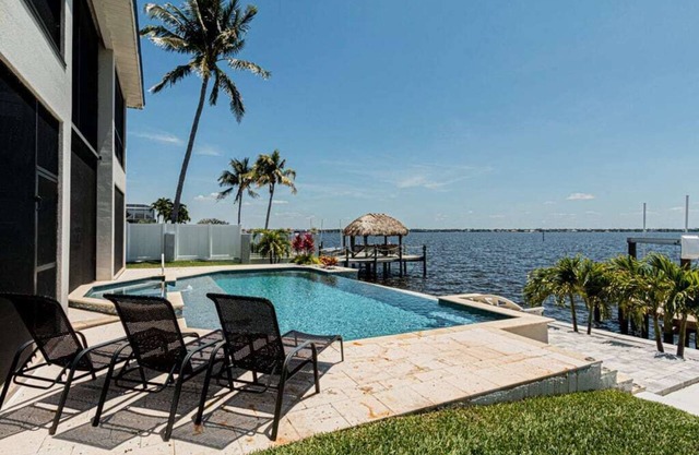 Breathtaking 6BD Riverfront Mansion w Pool